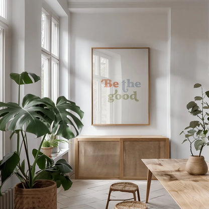 Be the Good II by Becky Thorns. shown as a print in a natural wood frame in a dining room. Available as a archival giclee rolled canvas, fine art paper, or poster print. SKU 70980h.