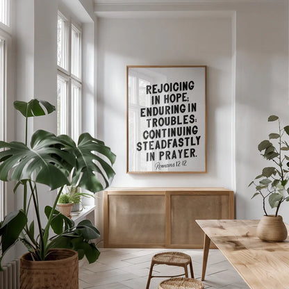 Bible Saying VI BW by Becky Thorns. shown as a print in a natural wood frame in a dining room. Available as a archival giclee rolled canvas, fine art paper, or poster print. SKU 67047h.