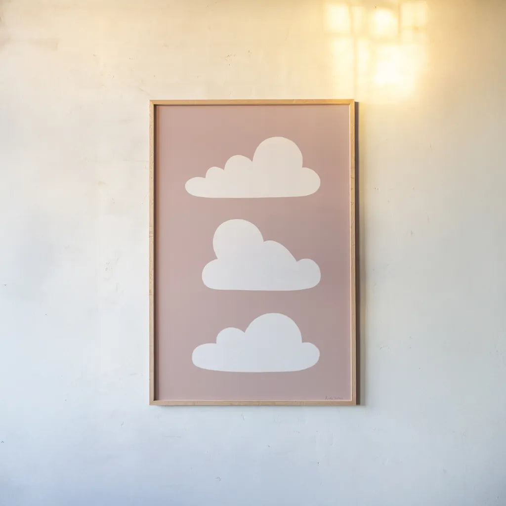 Boho Nursery Clouds by Becky Thorns. shown as a paper print in a natural frame. Available as a archival giclee rolled canvas, fine art paper, or poster print. SKU 71372h.
