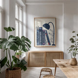 Bookish Blue I by Becky Thorns. shown as a print in a natural wood frame in a dining room. Available as a archival giclee rolled canvas, fine art paper, or poster print. SKU 97119h.