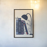 Bookish Blue I by Becky Thorns. shown as a paper print in a black flame. Available as a archival giclee rolled canvas, fine art paper, or poster print. SKU 97119h.