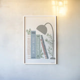 Bookish Blue I v2 by Becky Thorns. shown as a paper print in a white frame. Available as a archival giclee rolled canvas, fine art paper, or poster print. SKU 101554h.