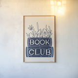 Bookish Blue II by Becky Thorns. shown as a paper print in a natural frame. Available as a archival giclee rolled canvas, fine art paper, or poster print. SKU 97120h.