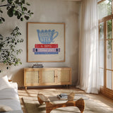 Bookish IV by Becky Thorns. Shown in a natural wood frame in a cozy modern living room. Available as an archival giclee rolled canvas, fine art paper, or poster print. SKU 97118a.