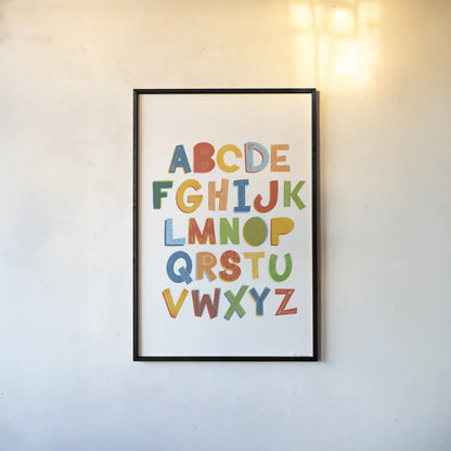 Colorful Alphabet by Becky Thorns. shown as a paper print in a black flame. Available as a archival giclee rolled canvas, fine art paper, or poster print. SKU 59586h.