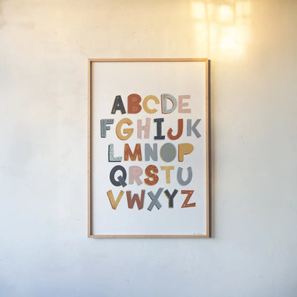 Colorful Alphabet Pastel by Becky Thorns. shown as a paper print in a natural frame. Available as a archival giclee rolled canvas, fine art paper, or poster print. SKU 66560h.