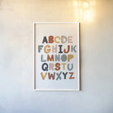 Colorful Alphabet Pastel by Becky Thorns. shown as a paper print in a white frame. Available as a archival giclee rolled canvas, fine art paper, or poster print. SKU 66560h.