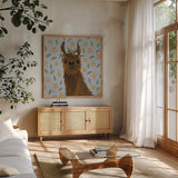 Delightful Alpacas II Floral Crop by Becky Thorns. Shown in a natural wood frame in a cozy modern living room. Available as an archival giclee rolled canvas, fine art paper, or poster print. SKU 58403a.