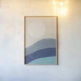 Desert Sunrise I Blue by Becky Thorns. shown as a paper print in a natural frame. Available as a archival giclee rolled canvas, fine art paper, or poster print. SKU 74762h.