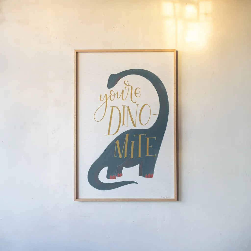 Dinomite by Becky Thorns. shown as a paper print in a natural frame. Available as a archival giclee rolled canvas, fine art paper, or poster print. SKU 61424h.