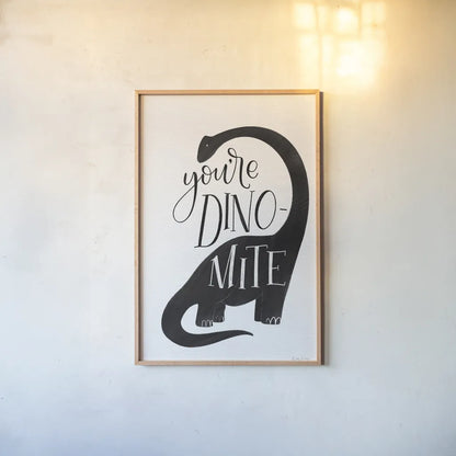 Dinomite BW by Becky Thorns. shown as a paper print in a natural frame. Available as a archival giclee rolled canvas, fine art paper, or poster print. SKU 61425h.