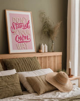 Don't Stand in Your Own Way Pink by Becky Thorns. shown as a paper print in a natural frame. Available as a archival giclee rolled canvas, fine art paper, or poster print. SKU 58405h.