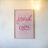 Don't Stand in Your Own Way Pink by Becky Thorns. shown as a paper print in a natural frame. Available as a archival giclee rolled canvas, fine art paper, or poster print. SKU 58405h.