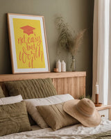 Graduation I Yellow by Becky Thorns. shown as a paper print in a natural frame. Available as a archival giclee rolled canvas, fine art paper, or poster print. SKU 59196h.