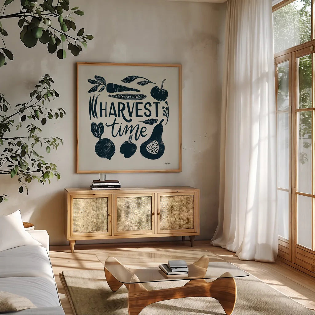 Harvest Lettering I Blue by Becky Thorns. Shown in a natural wood frame in a cozy modern living room. Available as an archival giclee rolled canvas, fine art paper, or poster print. SKU 75121a.