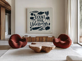 Harvest Lettering IV Blue by Becky Thorns. Shown as extra-large giant wall art in a modern living room. Available as an archival giclee rolled canvas, fine art paper, or poster print. SKU 75124a.