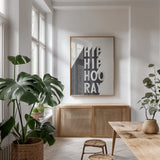 Hip Hip Hooray BW by Becky Thorns. shown as a print in a natural wood frame in a dining room. Available as a archival giclee rolled canvas, fine art paper, or poster print. SKU 59632h.