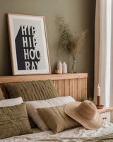 Hip Hip Hooray BW by Becky Thorns. shown as a paper print in a natural frame. Available as a archival giclee rolled canvas, fine art paper, or poster print. SKU 59632h.
