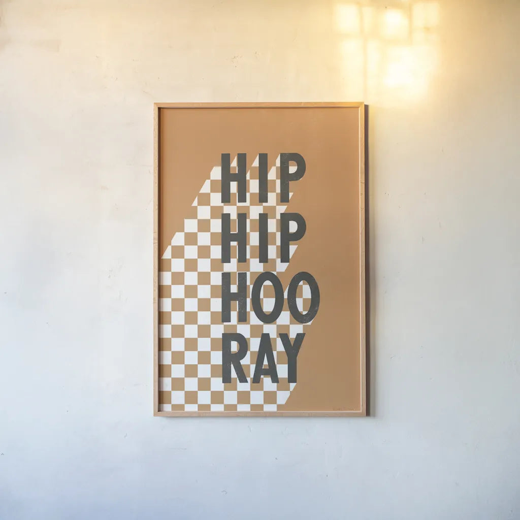 Hip Hip Hooray Checkered by Becky Thorns. shown as a paper print in a natural frame. Available as a archival giclee rolled canvas, fine art paper, or poster print. SKU 87463h.