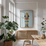 Holiday Cheer Nutcrackers II by Becky Thorns. shown as a print in a natural wood frame in a dining room. Available as a archival giclee rolled canvas, fine art paper, or poster print. SKU 83913h.