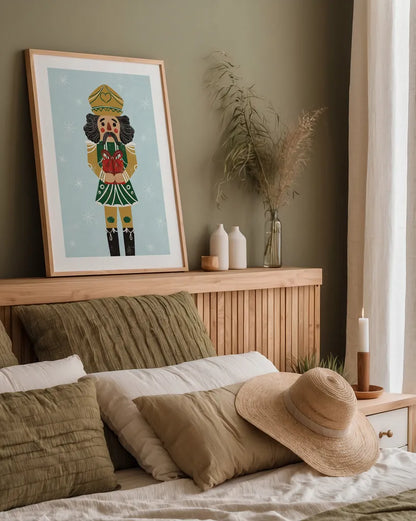 Holiday Cheer Nutcrackers II by Becky Thorns. shown as a paper print in a natural frame. Available as a archival giclee rolled canvas, fine art paper, or poster print. SKU 83913h.