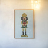 Holiday Cheer Nutcrackers II by Becky Thorns. shown as a paper print in a natural frame. Available as a archival giclee rolled canvas, fine art paper, or poster print. SKU 83913h.