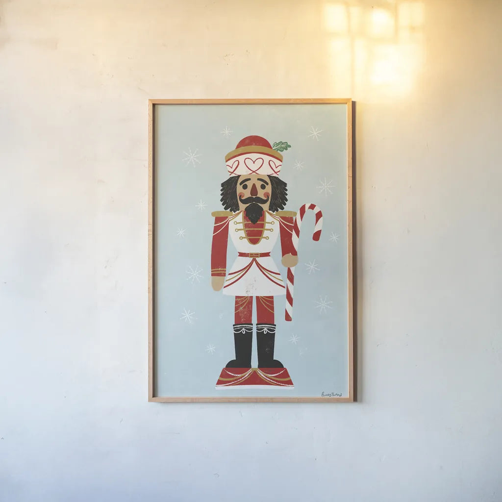 Holiday Cheer Nutcrackers III by Becky Thorns. shown as a paper print in a natural frame. Available as a archival giclee rolled canvas, fine art paper, or poster print. SKU 83914h.