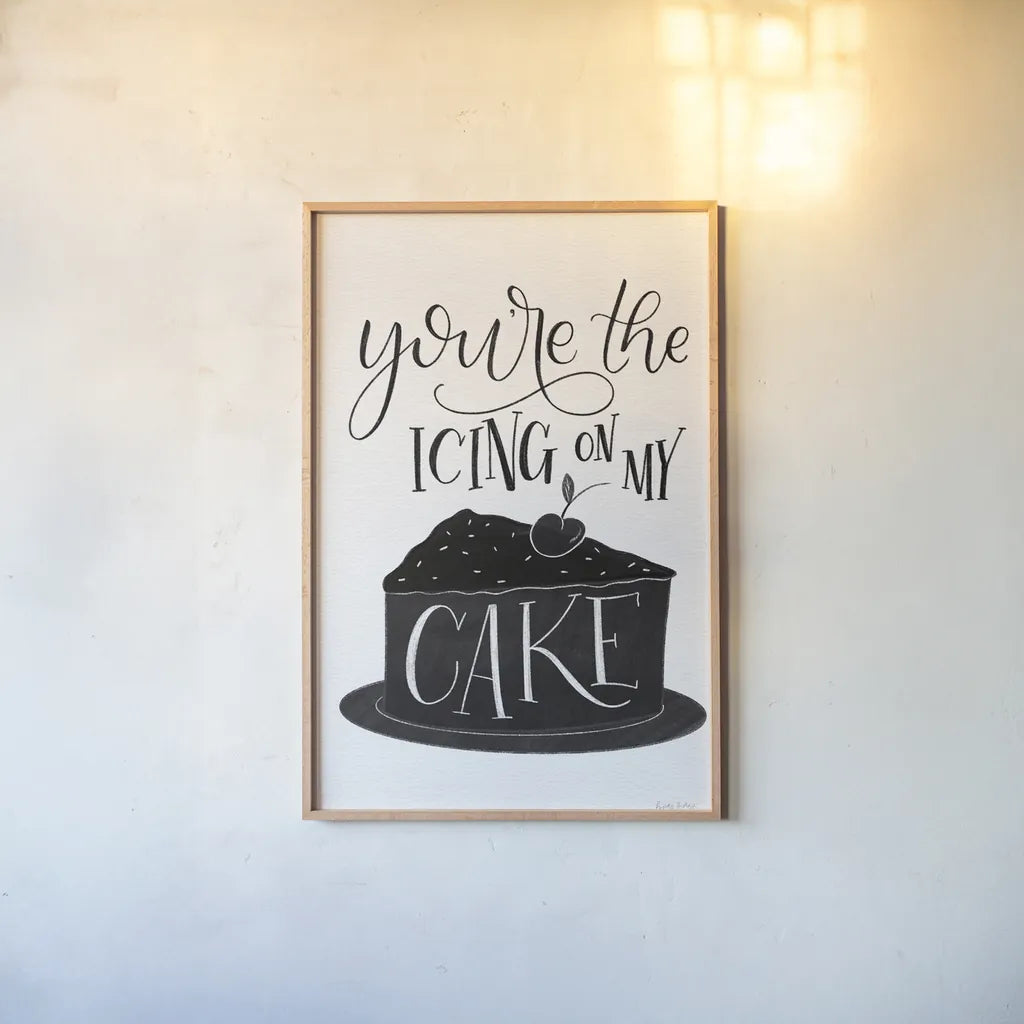 Icing On My Cake BW by Becky Thorns. shown as a paper print in a natural frame. Available as a archival giclee rolled canvas, fine art paper, or poster print. SKU 61421h.