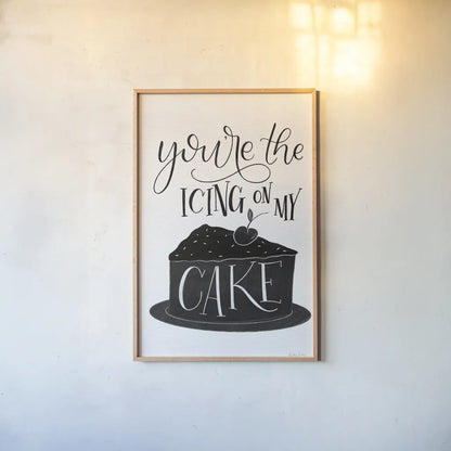 Icing On My Cake BW by Becky Thorns. shown as a paper print in a natural frame. Available as a archival giclee rolled canvas, fine art paper, or poster print. SKU 61421h.