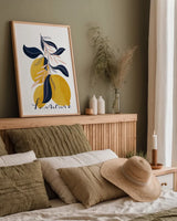Lemons I by Becky Thorns. shown as a paper print in a natural frame. Available as a archival giclee rolled canvas, fine art paper, or poster print. SKU 64702h.