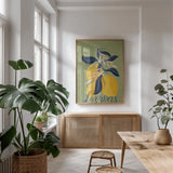 Lemons I Green by Becky Thorns. shown as a print in a natural wood frame in a dining room. Available as a archival giclee rolled canvas, fine art paper, or poster print. SKU 64704h.