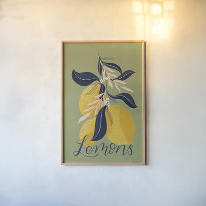Lemons I Green by Becky Thorns. shown as a paper print in a natural frame. Available as a archival giclee rolled canvas, fine art paper, or poster print. SKU 64704h.