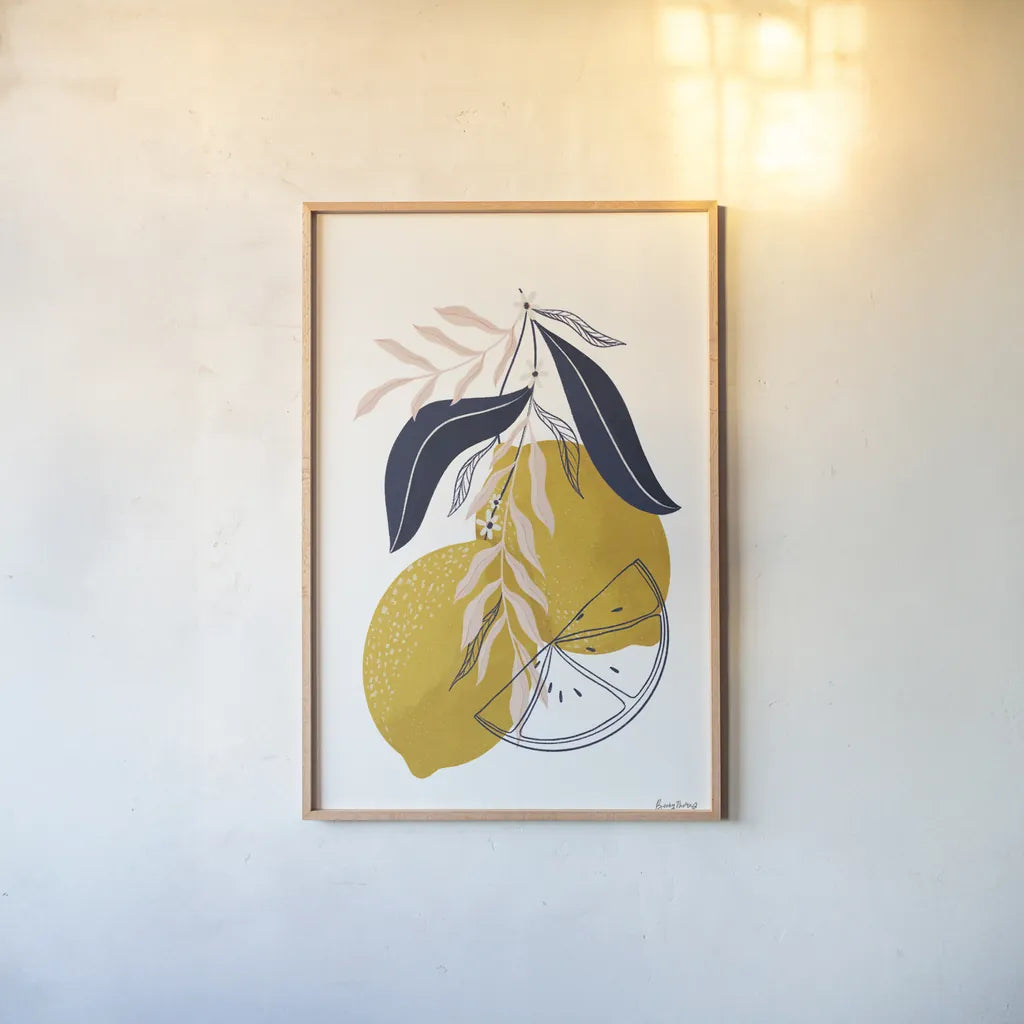 Lemons II by Becky Thorns. shown as a paper print in a natural frame. Available as a archival giclee rolled canvas, fine art paper, or poster print. SKU 64703h.