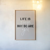 Life is Tough by Becky Thorns. shown as a paper print in a natural frame. Available as a archival giclee rolled canvas, fine art paper, or poster print. SKU 61716h.