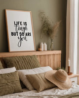 Life is Tough BW by Becky Thorns. shown as a paper print in a natural frame. Available as a archival giclee rolled canvas, fine art paper, or poster print. SKU 64207h.