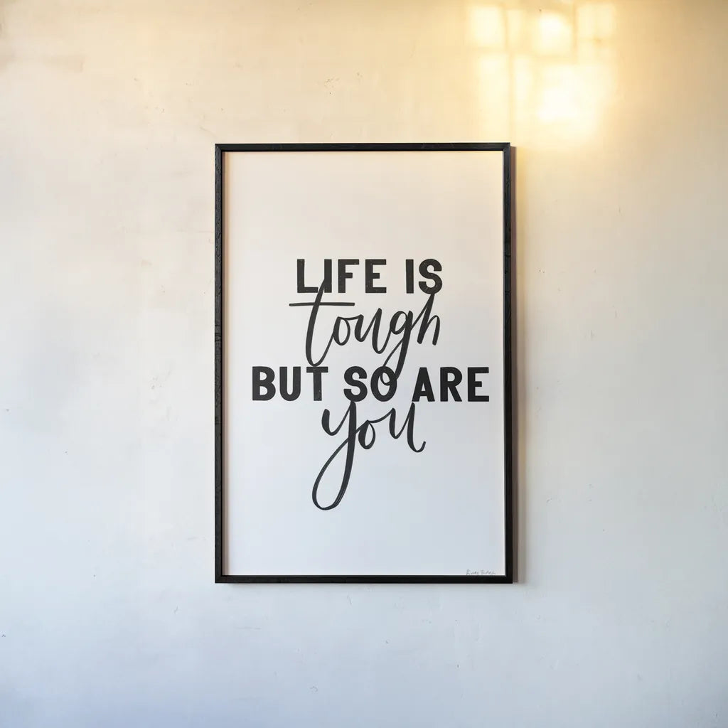 Life is Tough BW by Becky Thorns. shown as a paper print in a black flame. Available as a archival giclee rolled canvas, fine art paper, or poster print. SKU 64207h.