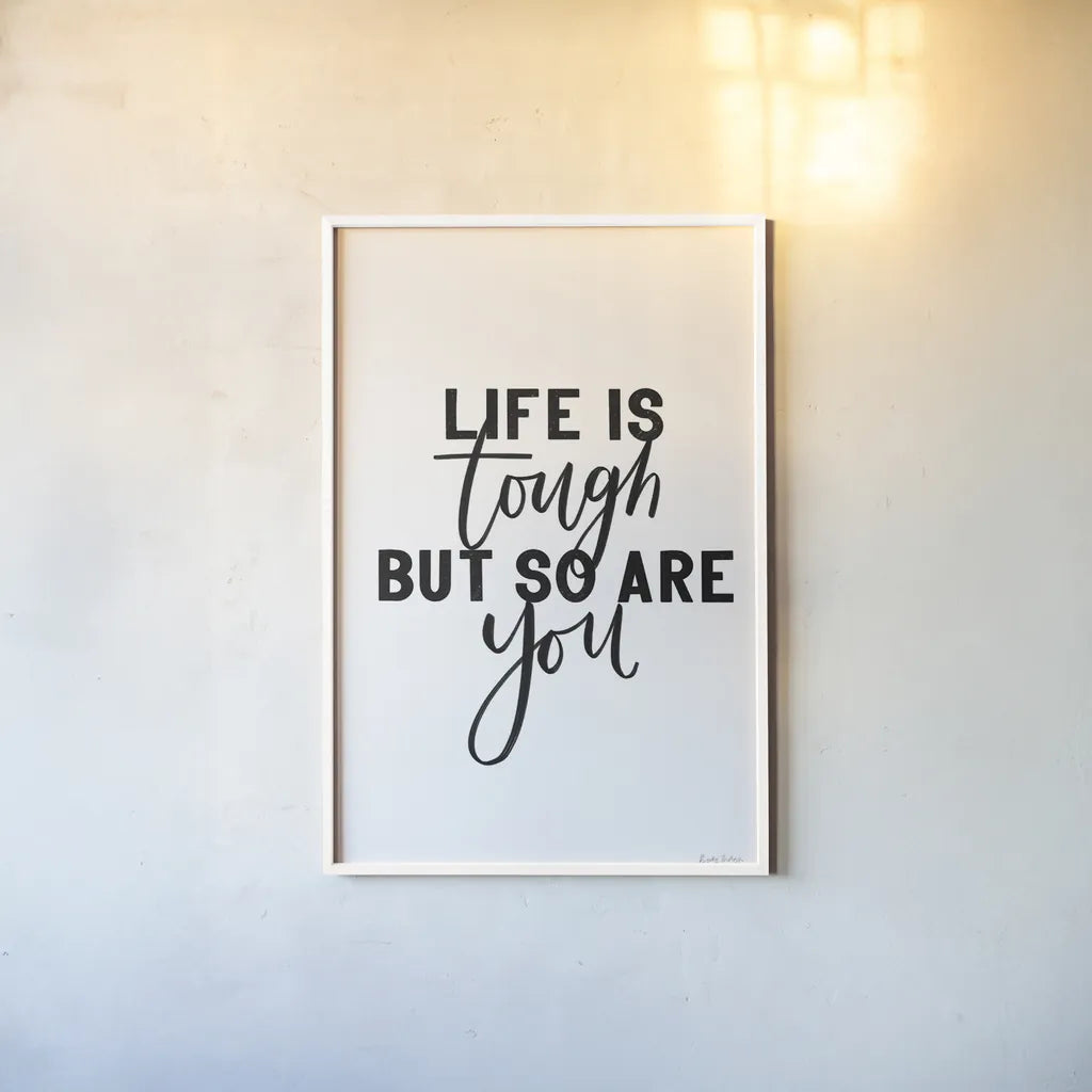 Life is Tough BW by Becky Thorns. shown as a paper print in a white frame. Available as a archival giclee rolled canvas, fine art paper, or poster print. SKU 64207h.