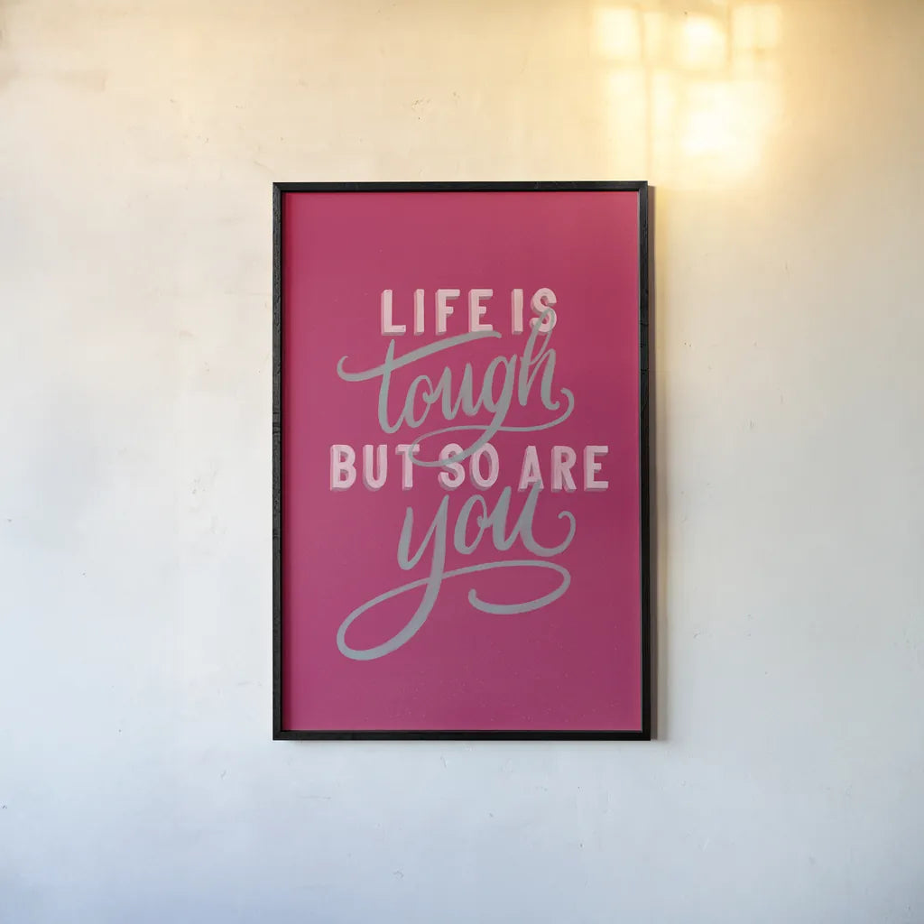 Life is Tough Bright Rose by Becky Thorns. shown as a paper print in a black flame. Available as a archival giclee rolled canvas, fine art paper, or poster print. SKU 58406h.