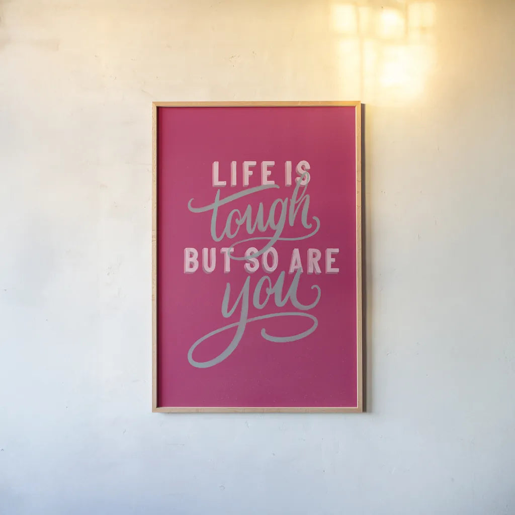 Life is Tough Bright Rose by Becky Thorns. shown as a paper print in a natural frame. Available as a archival giclee rolled canvas, fine art paper, or poster print. SKU 58406h.