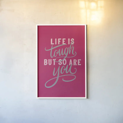 Life is Tough Bright Rose by Becky Thorns. shown as a paper print in a white frame. Available as a archival giclee rolled canvas, fine art paper, or poster print. SKU 58406h.