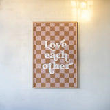 Love Each Other II Checkered by Becky Thorns. shown as a paper print in a natural frame. Available as a archival giclee rolled canvas, fine art paper, or poster print. SKU 87459h.