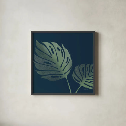Monstera II by Becky Thorns. Shown in a sleek black glass frame for a contemporary gallery look. Available as an archival giclee rolled canvas, fine art paper, or poster print. SKU 52080a.