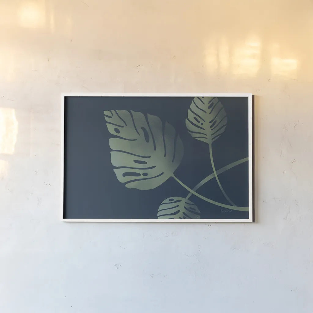 Monstera V by Becky Thorns. shown as a paper print in a white frame. Available as a archival giclee rolled canvas, fine art paper, or poster print. SKU 52083i.