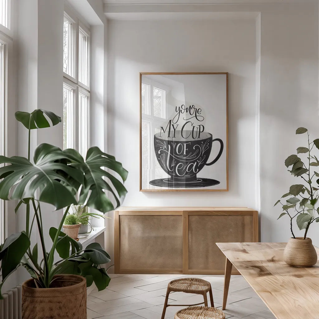 My Cup of Tea BW by Becky Thorns. shown as a print in a natural wood frame in a dining room. Available as a archival giclee rolled canvas, fine art paper, or poster print. SKU 61427h.