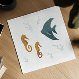 Ocean Life Seahorses on White by Becky Thorns. Shown as a detailed flat fine art print, highlighting archival giclee quality. Available as an archival giclee rolled canvas, fine art paper, or poster print. SKU 56477a.