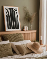 Organic Abstract I Black by Becky Thorns. shown as a paper print in a natural frame. Available as a archival giclee rolled canvas, fine art paper, or poster print. SKU 88498h.