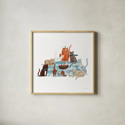 Picnic Pets Cats I by Becky Thorns. Shown in a natural wood glass frame for a timeless modern aesthetic. Available as an archival giclee rolled canvas, fine art paper, or poster print. SKU 61398a.