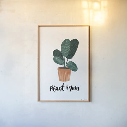 Plant Mom by Becky Thorns. shown as a paper print in a natural frame. Available as a archival giclee rolled canvas, fine art paper, or poster print. SKU 65070h.
