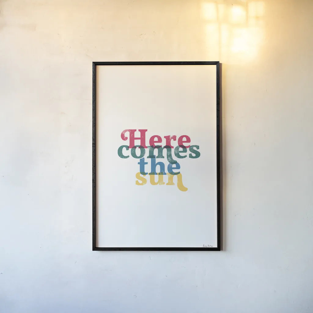 Rainbow Here Comes the Sun by Becky Thorns. shown as a paper print in a black flame. Available as a archival giclee rolled canvas, fine art paper, or poster print. SKU 65202h.