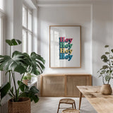 Rainbow Hey Bold by Becky Thorns. shown as a print in a natural wood frame in a dining room. Available as a archival giclee rolled canvas, fine art paper, or poster print. SKU 65210h.